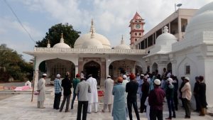Devotees Prays and recite Quran at Pirana Dargah